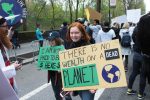 Earth Day’s activist origins had, until only recently, receded into the past, overshadowed by corporate America’s takeover of the holiday. But a younger generation, inspired by the likes of Greta Thunberg, is once again taking to the streets. Courtesy Terry Ballard/Creative Commons